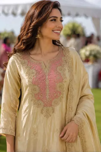 ethnic motifs embroidered thread work tissue kurta with palazzos & dupatta