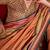 Orange ethnic motifs printed zari banarasi saree