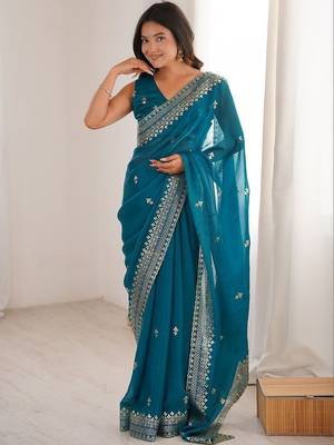 Teal ethnic motifs zari satin heavy work saree 1