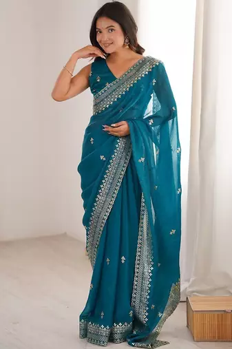 Teal ethnic motifs zari satin heavy work saree