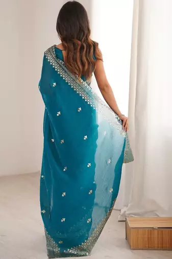 Teal ethnic motifs zari satin heavy work saree