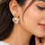 Anti-tarnish, stud back closure, dangling chain, puffy heart charm