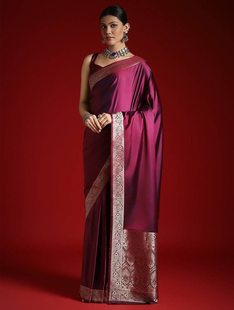 Magenta solid woven design saree with matching blouse