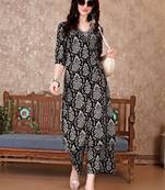 women ethnic motifs printed regular thread work kurta with trousers