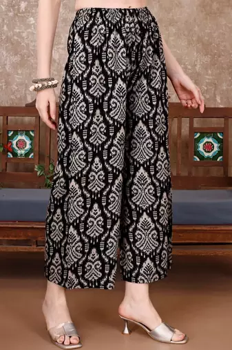 women ethnic motifs printed regular thread work kurta with trousers