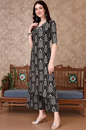 women ethnic motifs printed regular thread work kurta with trousers