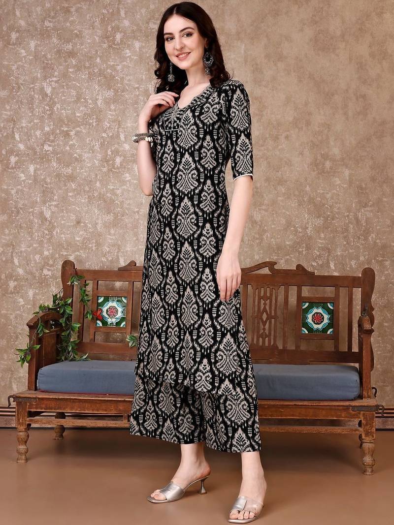 women ethnic motifs printed regular thread work kurta with trousers