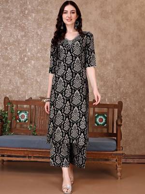women ethnic motifs printed regular thread work kurta with trousers 7