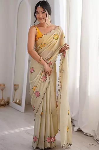 Off white cream georgette ethnic embellished festive wear matching blouse sarees