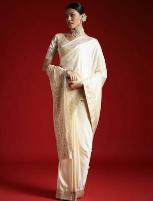 Cream cream solid zari woven design satin banarasi saree with matching blouse 4