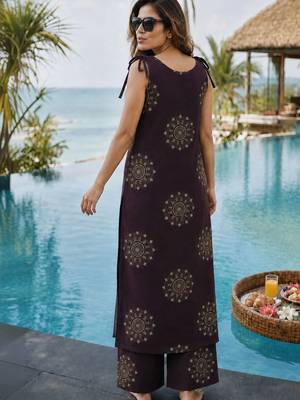 women ethnic motifs printed regular mirror work kurta with palazzos 4