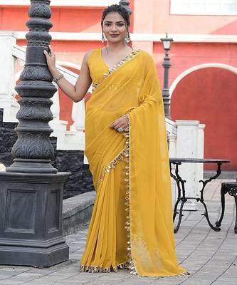 Yellow embellished mirror work  georgette saree 1