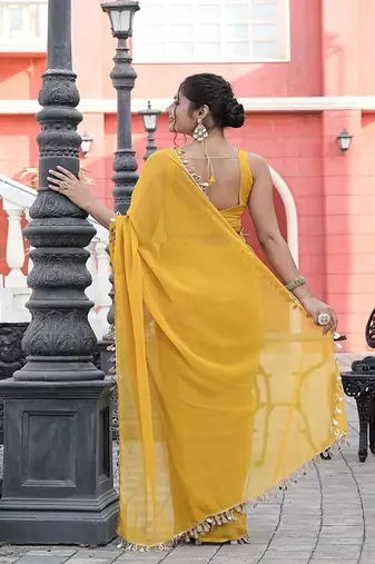 Yellow embellished mirror work  georgette saree