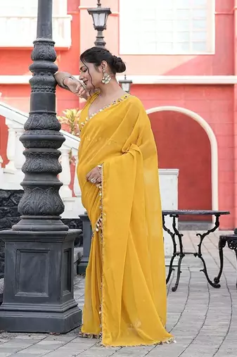 Yellow embellished mirror work  georgette saree