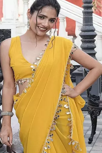 Yellow embellished mirror work  georgette saree