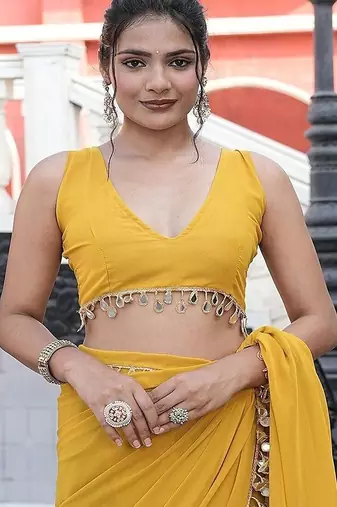 Yellow embellished mirror work  georgette saree