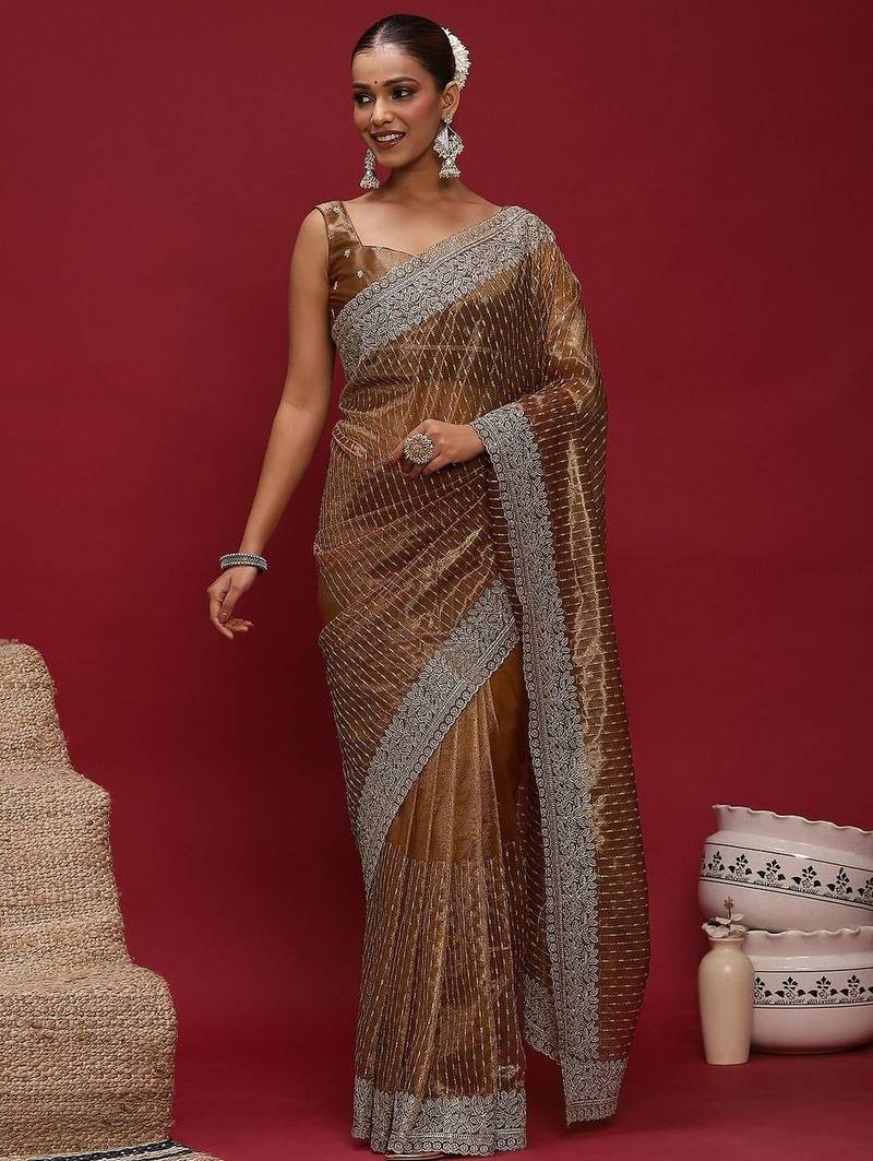 Brown brown embellished zari net designer striped saree
