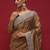 Brown brown embellished zari net designer striped saree