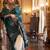 Green women woven design zari satin banarasi saree