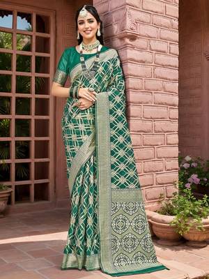 Green geometric embroidered zari saree 1
