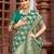 Green geometric embroidered zari saree
