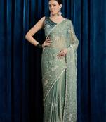 Sea green women floral embroidered saree with blouse piece