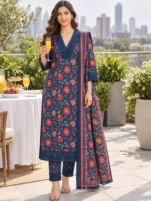 women floral printed regular  cotton kurta with trousers & with dupatta 1
