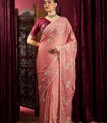 Peach ethnic motifs sequinned saree
