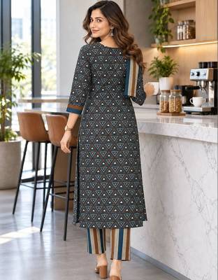 women printed regular  cotton kurta with trousers & with dupatta 4