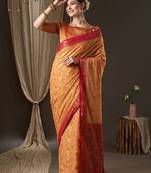Peach peach-coloured & red woven design zari  georgette kanjeevaram saree