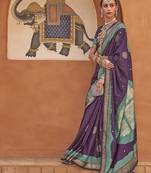 Purple purple & green geometric woven design zari saree