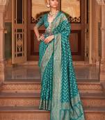 Teal woven design zari silk blend banarasi saree