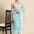 Turquoise organza bandhani saree
