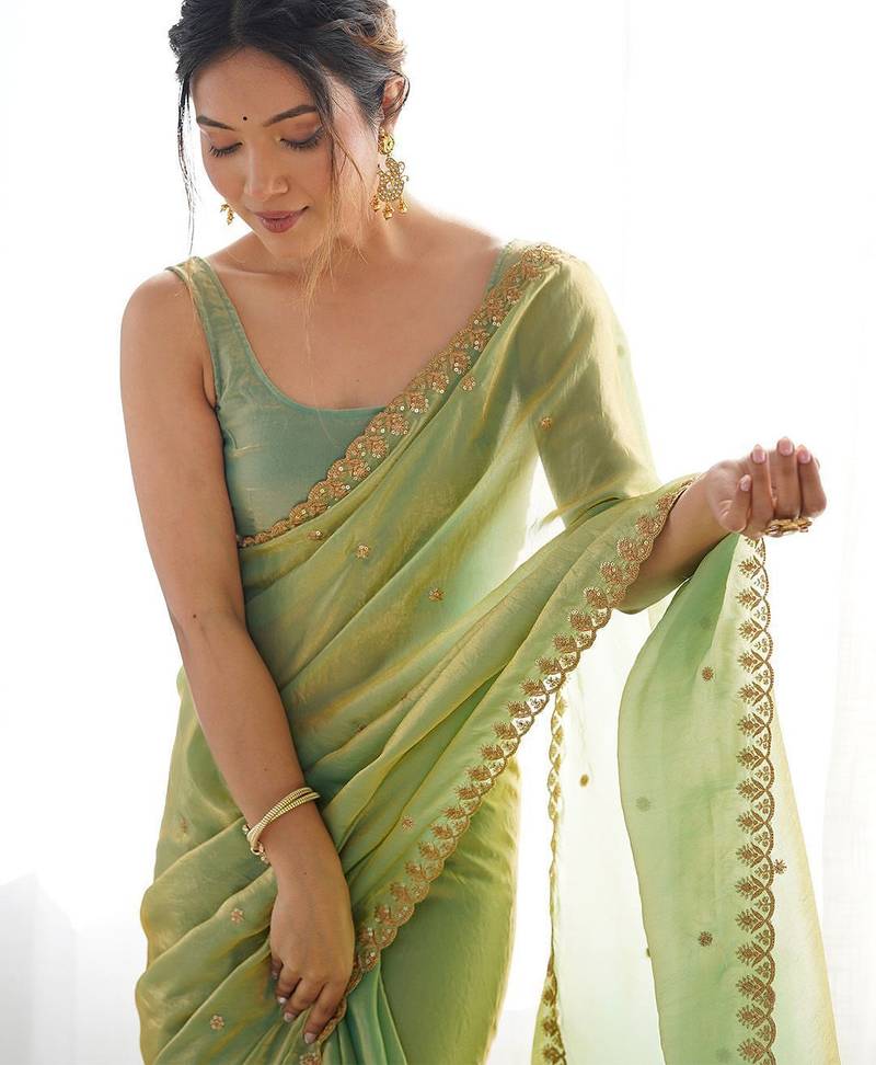 Green embellished sequinned tissue saree