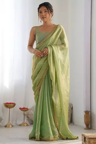 Green embellished sequinned tissue saree
