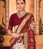 Off white ethnic motifs zari silk blend patola saree