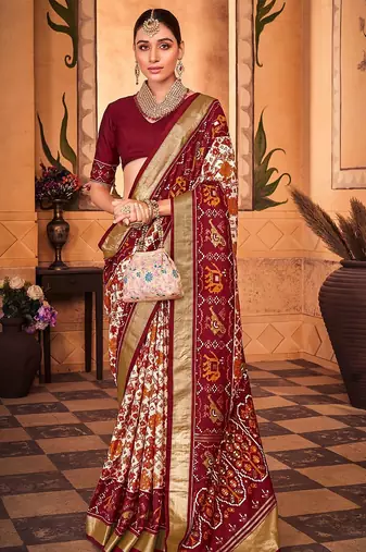 Off white ethnic motifs zari silk blend patola saree