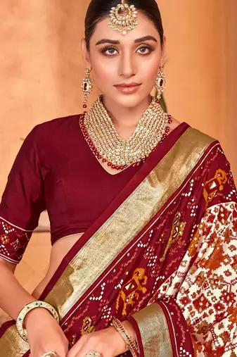 Off white ethnic motifs zari silk blend patola saree