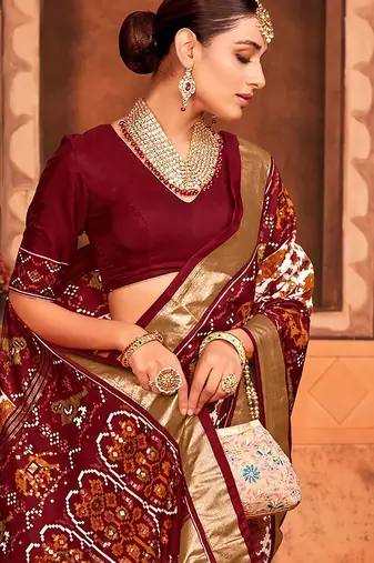 Off white ethnic motifs zari silk blend patola saree
