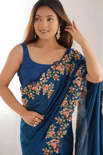 Teal floral embroidered saree
