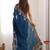 Teal floral embroidered saree