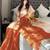 Rust rust woven design tissue sarees