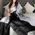 Black black woven design tissue sarees