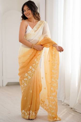 White woven design embroidered poly chiffon saree