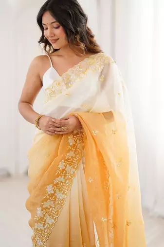 White woven design embroidered poly chiffon saree