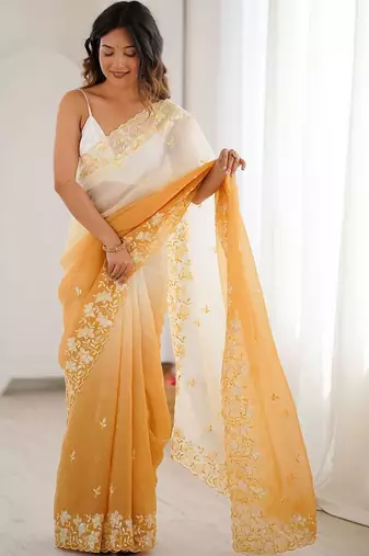 White woven design embroidered poly chiffon saree
