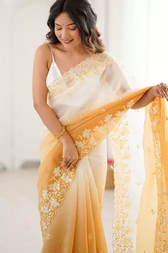 White woven design embroidered poly chiffon saree