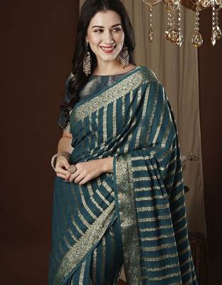 Teal zari woven striped  georgette kanjeevaram saree 1