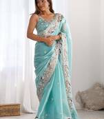 Blue embellished sequinned organza saree