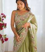 Green embellished sequinned organza saree